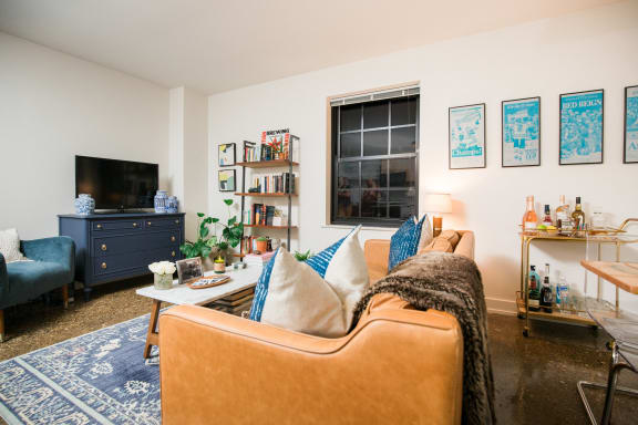 a living room with a couch and a television