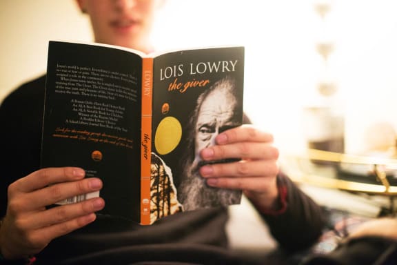 a person is reading a book