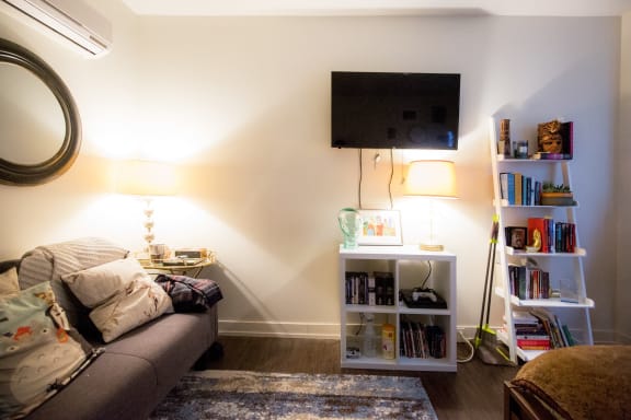 a living room with a couch and a television