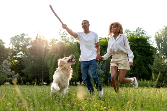 couple with a dog at Cumberland Crossing, Cumberland, 02864