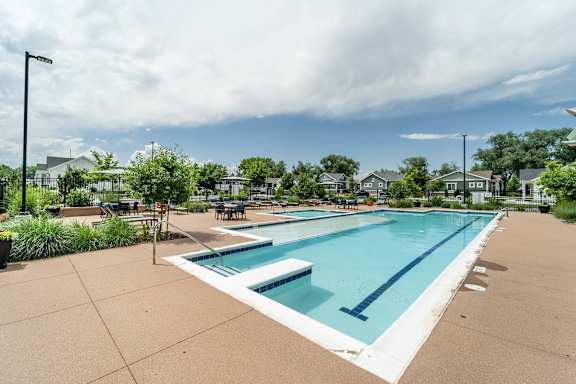the swimming pool at the estates apartments