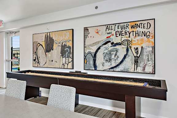 A painting with the words  at Red Rock Apartments, Rapid City, South Dakota