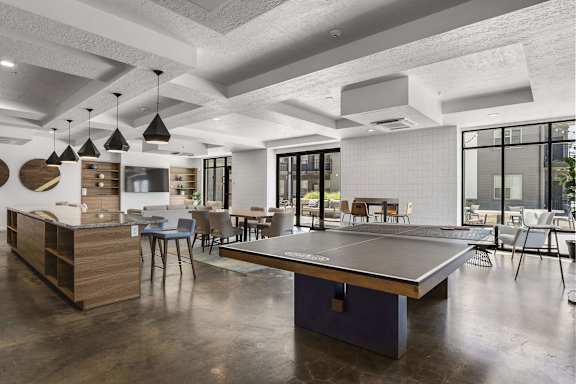 Communal Area with a Ping Pong Table at The Flats at Riverwoods, Provo, UT, 84604