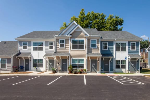 a building with a parking lot in front of it