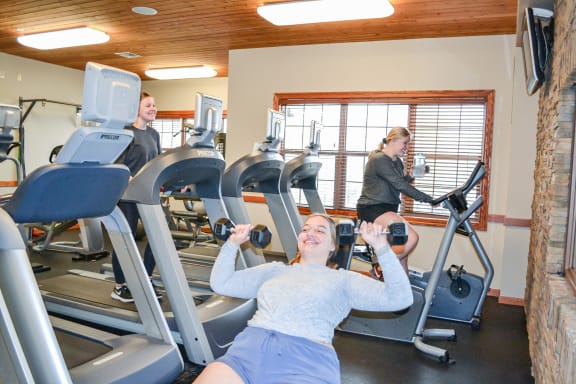 a group of women working out on the machines in the gym at Summit Ridge, Duluth, MN