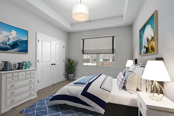 A bedroom with a large bed and a painting on the wall.