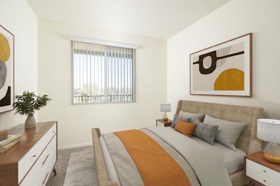 a bedroom with a bed and a ceiling fan