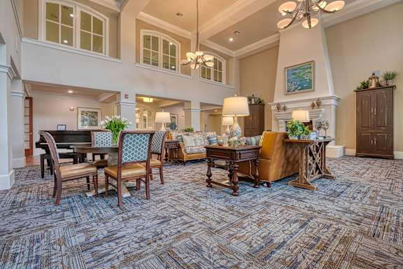 a living room with furniture and a piano at Mariposa at South Broadway, Texas, 76058