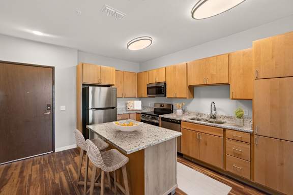 a rendering of a gym with people exercising on treadmills at The Stillwaters 62+ Apartment Homes, Apopka, FL, 32712