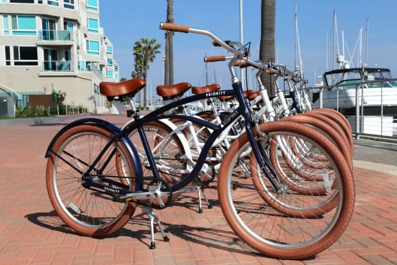 a row of bikes parked next to each other  at Esprit Apartments, Marina del Rey, 90292