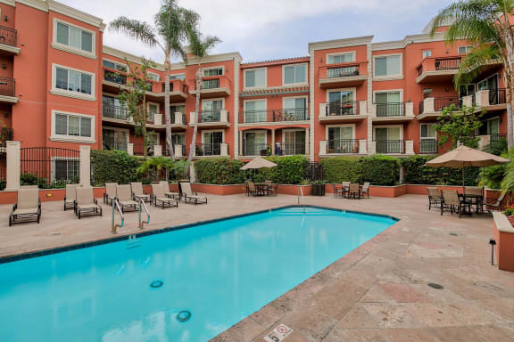 A large swimming pool in front of apartment buildings. at Marina Harbor, Marina del Rey, CA