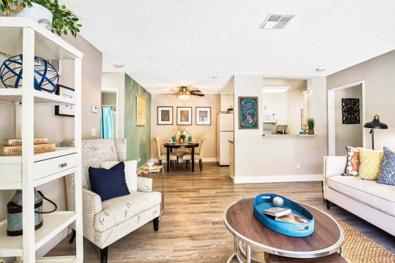 a living room with a couch and a table at Mountain Vista, Victorville, California