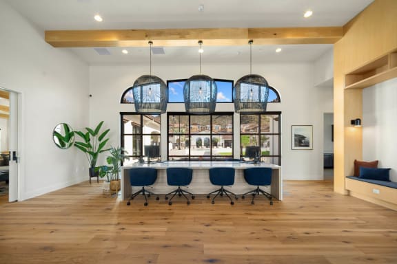 a dining room with a table and chairs in front of a window at Anacapa Canyon, Camarillo, 93012
