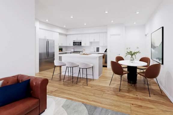A modern kitchen with a dining table set for four.