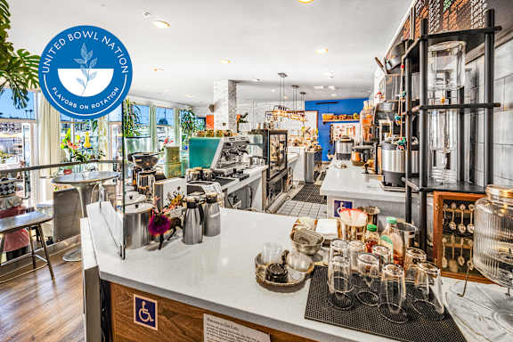 A cafe with a sign that says United Bowl Nation.