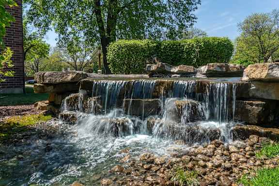 A small waterfall in a garden.