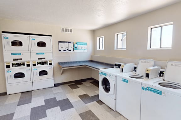 A laundromat with washers and dryers.