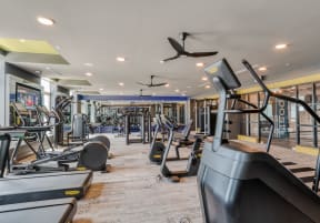 a gym with treadmills and other exercise equipment at Vista Brooklynn Apartments, Jacksonville, 32202