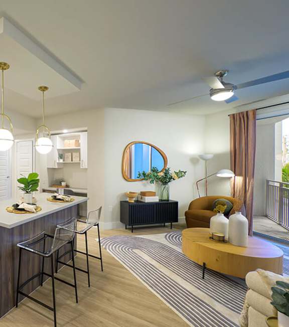 Kitchen and dining area at Coasterra Apartments in Fort Lauderdale FL