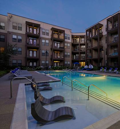 Resort-style swimming pool at dusk - 23Hundred at Berry Hill