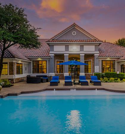 Lounge seating by resort-style saltwater pool - DeLayne at Twin Creeks