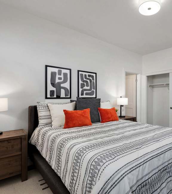 Bedroom with Bed and Nightstand with Lamp