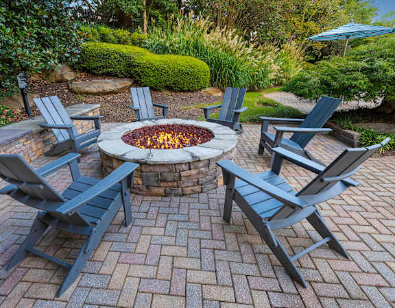 Fire pit with seating - Evergreen Lenox Park