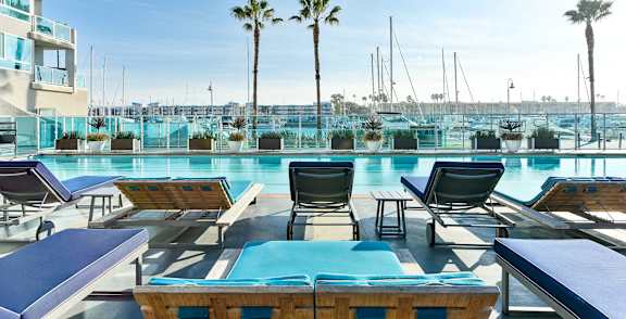 boats docked at a marina with buildings in the background  at Esprit Apartments, Marina del Rey