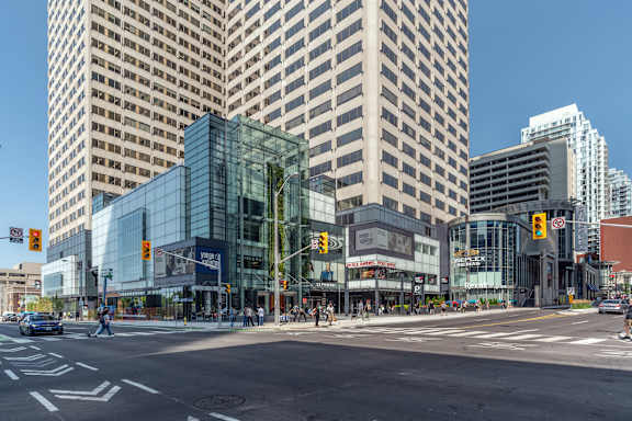 a city street with tall buildings and a traffic light at 107 Redpath, Toronto, CA M4S 2J9