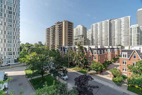 a view of a city street with tall buildings at 107 Redpath, Toronto California