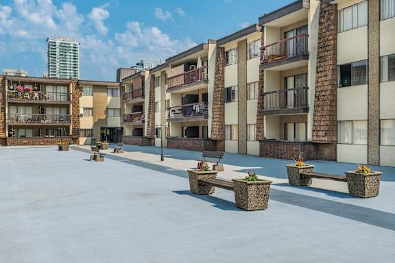 A sunny day at the courtyard of a residential building.