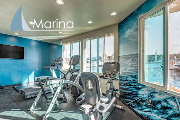 A gym with a view of the water.