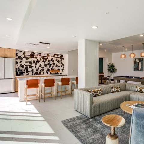 a living room and kitchen in a 555 waverly unit at THE MOD AT MIDTOWN Apartments, Sacramento, CA, 95814