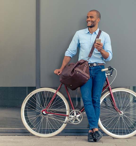 Man Standing With A Bicycle at 360 Luxury Apartments, California, 92122
