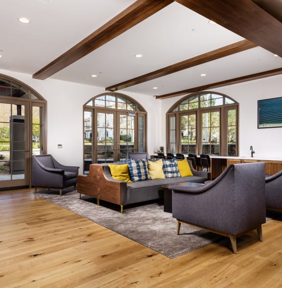 a living room with furniture and large windows  at Mission Hills, California, 93012