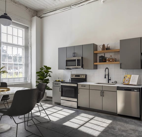 Modern Kitchen Area at Highland Mill Lofts in NC 28205