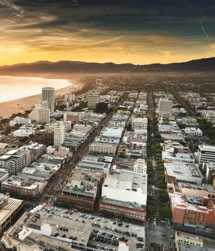 an aerial view of the city of coronado at sunset