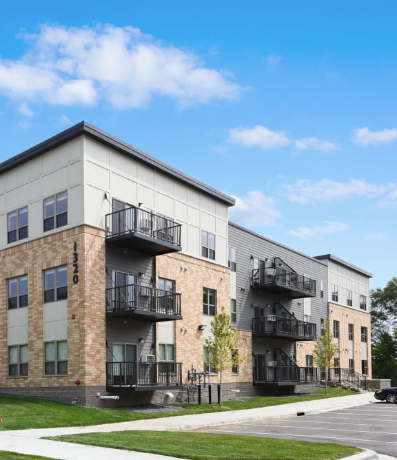 Glen Pond Additions Apartments | an exterior view of an apartment building with balconies