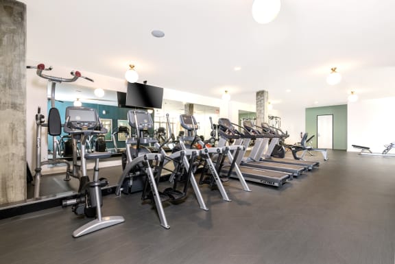 a row of treadmills and other exercise equipment in a gym  at Mission Hills, Camarillo, CA