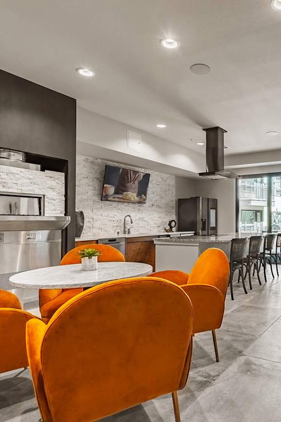 Kitchen with seating at Opal Legacy Central in Plano TX