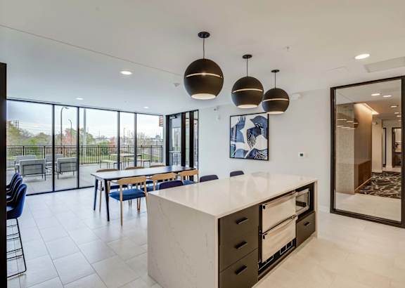 Kitchen with a Large Island at Peregrine Apartments, Minneapolis, MN, 55411