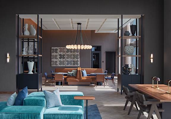 a living room filled with furniture and a large window