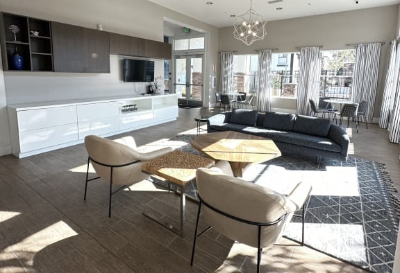a living room and kitchen with a table and chairs at The Bryant Apartments at Yorba Linda, Yorba Linda, CA 92887