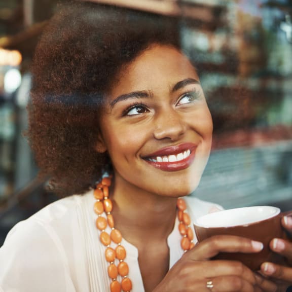 a woman drinking coffee  at Quail Springs, West Richland, WA, 99353