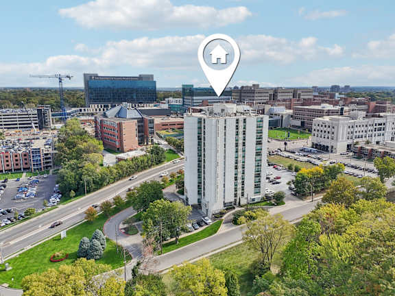 Map pin points a location on a cityscape at Vista Condominiums, Kansas City, KS