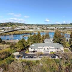 aerial view of apartments and lake