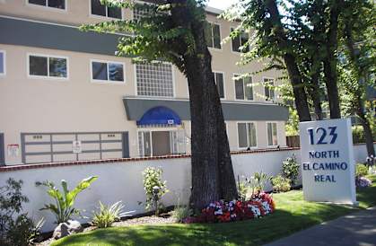 an image of an apartment building with a sign for 121 north el camino real