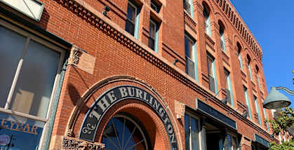 The Burlington pub has a large arched window.