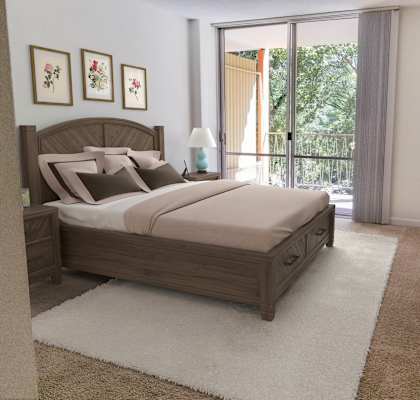 a bedroom with a bed and a rug at The Riverview (55+), California, 95814