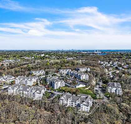 A bird's eye view of a residential area with multiple houses.